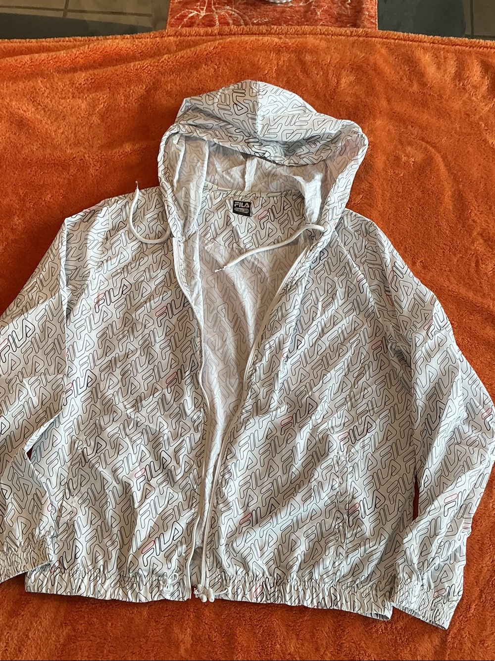 FILA White Hooded Windbreaker with All-Over Logo Print